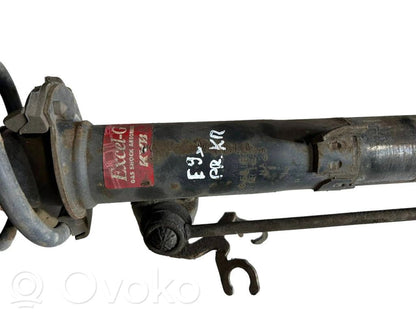 Priekšpusē amortizators ar atsperi