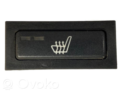 Sēdekļu apsildes slēdzis