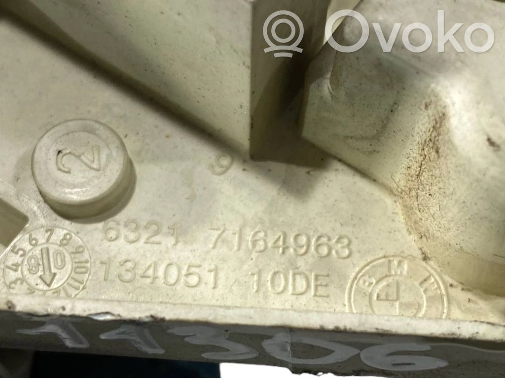 Rear lamp cover holder