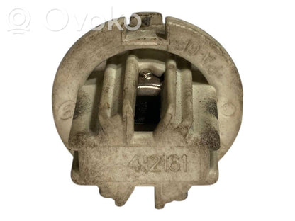 Aizmugures spuldzes vāka turētājs