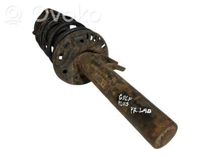 Priekšpusē amortizators ar atsperi