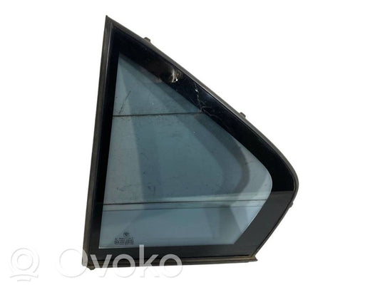 Small glass "A" in the rear door