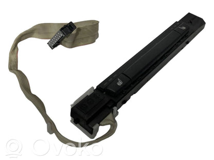 Sēdekļu apsildes slēdzis