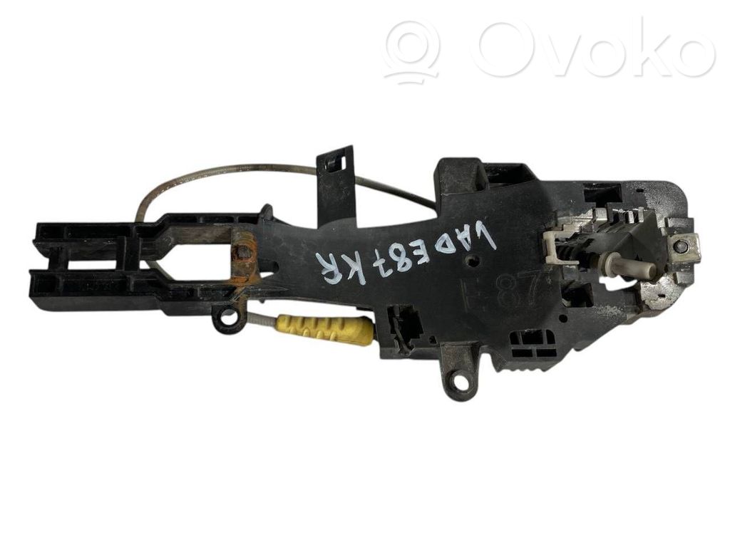 Holder/bracket for external opening handle at the front