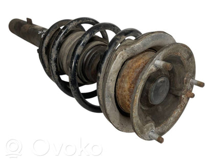 Priekšpusē amortizators ar atsperi