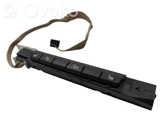 Sēdekļu apsildes slēdzis