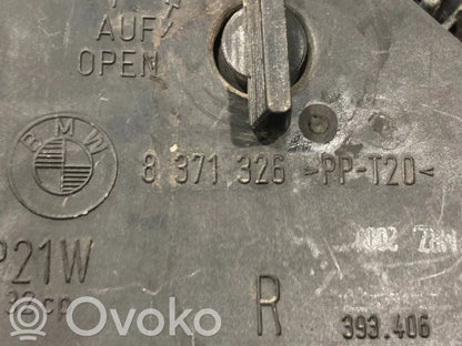 Aizmugures spuldzes vāka turētājs