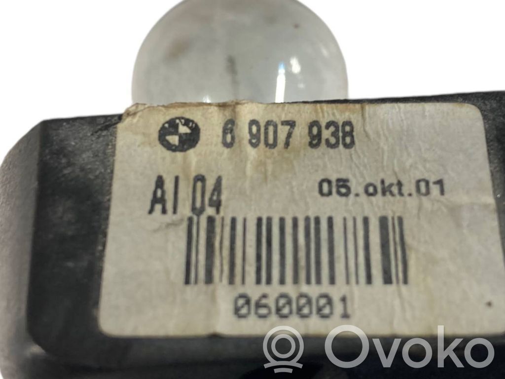 Aizmugures spuldzes vāka turētājs