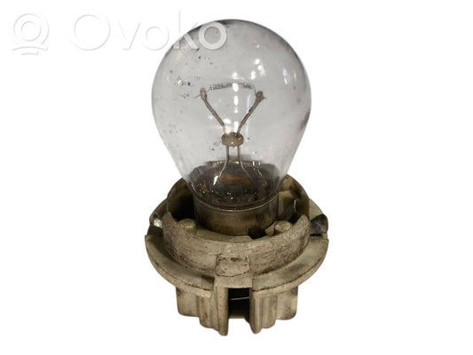 Aizmugures spuldzes vāka turētājs