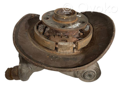 Aizmugurē riteņa rumbas vārpstas šarnīrs (stupica, capfa)