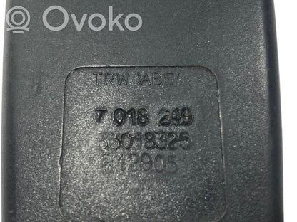 Vidējās jostas sprādze (aizmugurē)