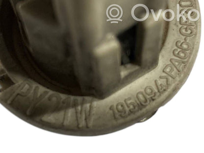 Aizmugures spuldzes vāka turētājs