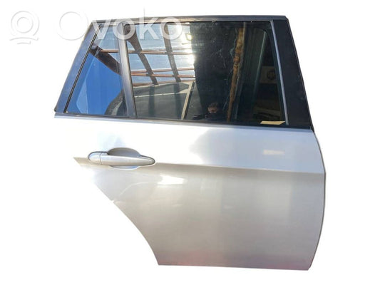 Aizmugurējās durvis