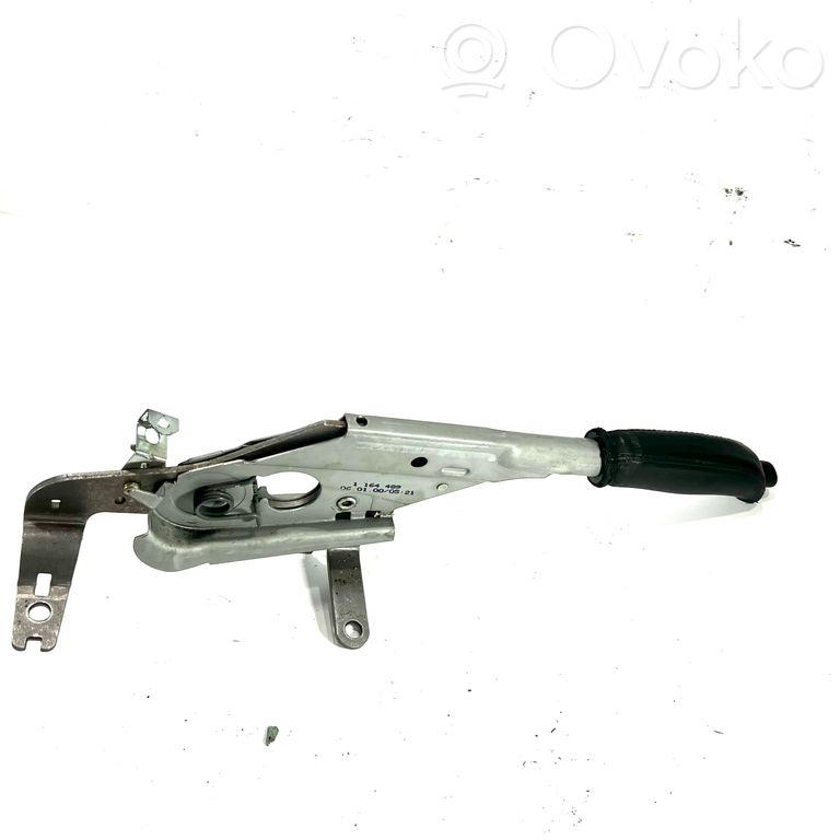 Rokas bremzes mehānisms (salonā)