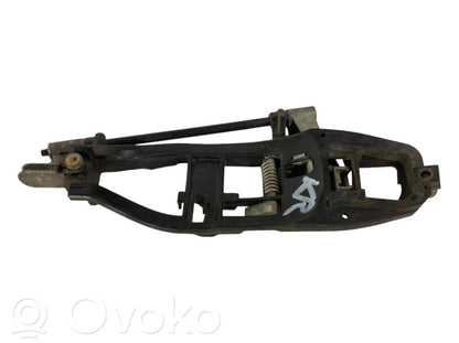 Holder/bracket for external opening handle at the front