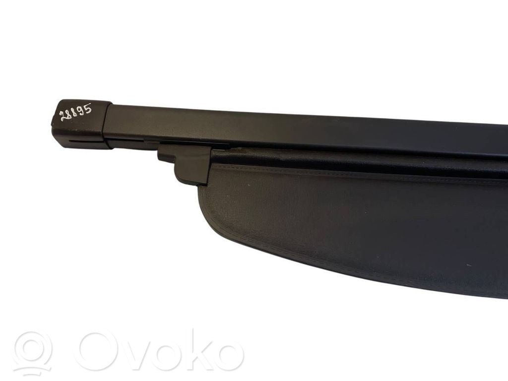 Bagāžnieks logu aizkars