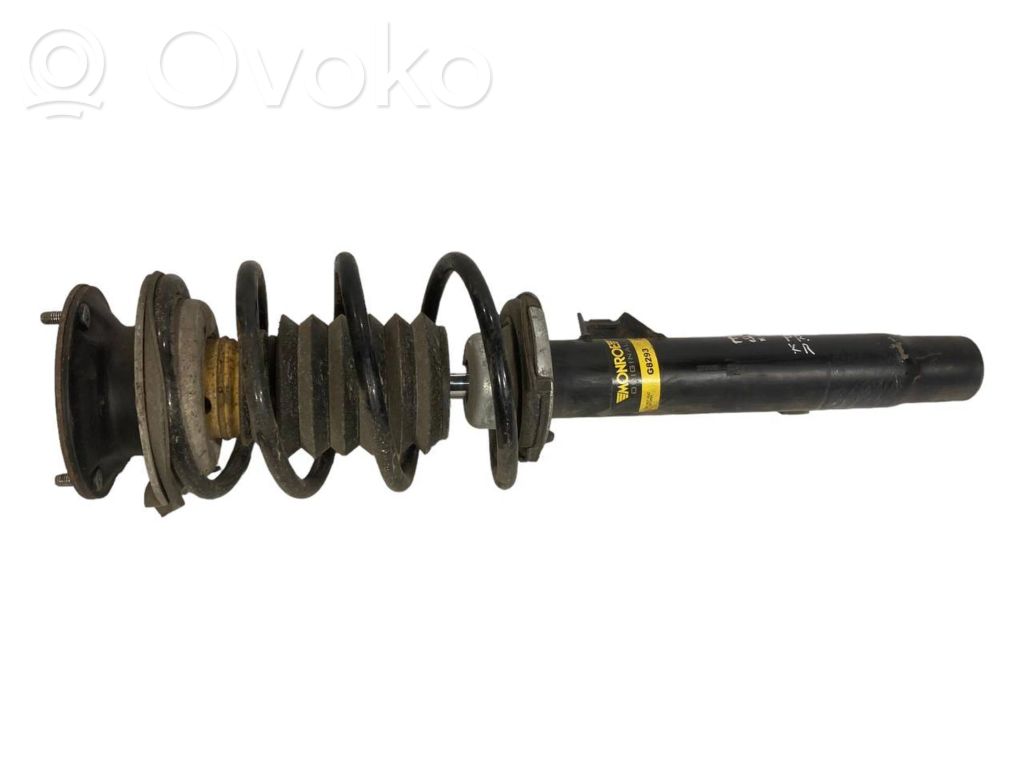 Priekšpusē amortizators ar atsperi