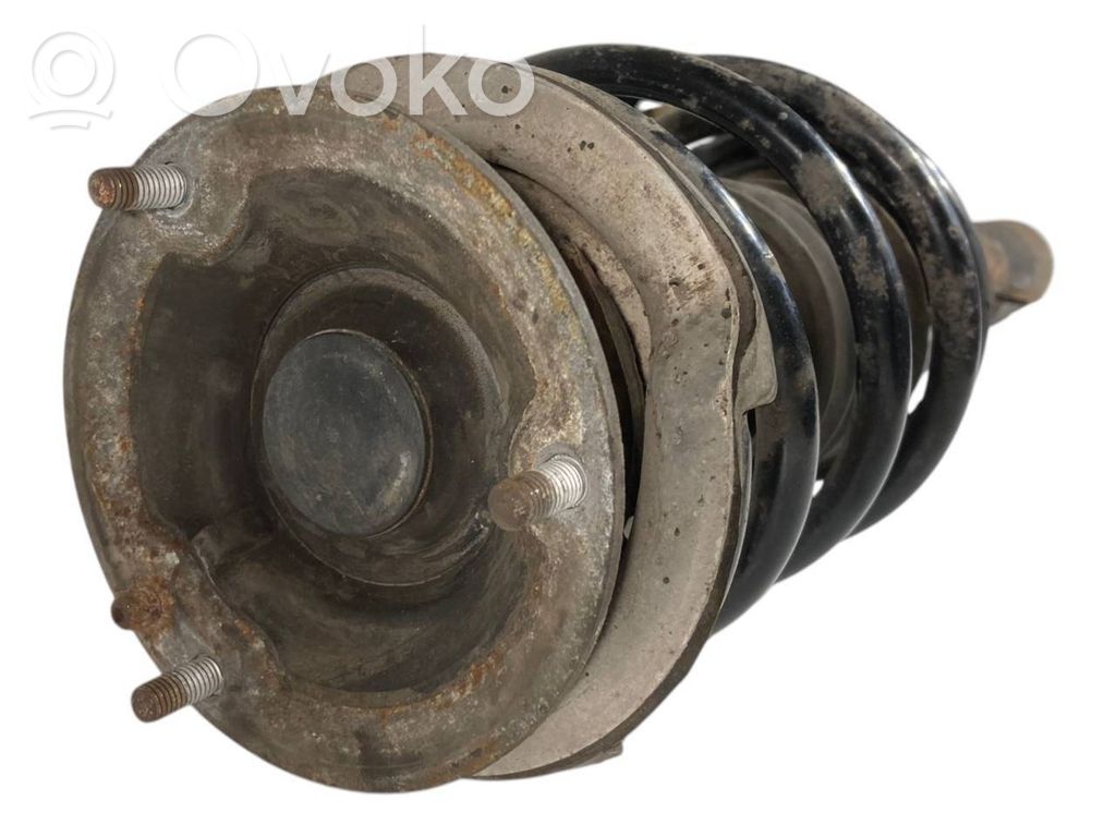 Priekšpusē amortizators ar atsperi