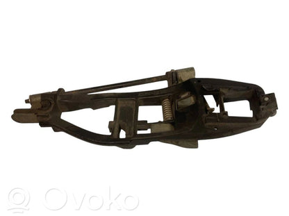 Holder/bracket for external opening handle at the front