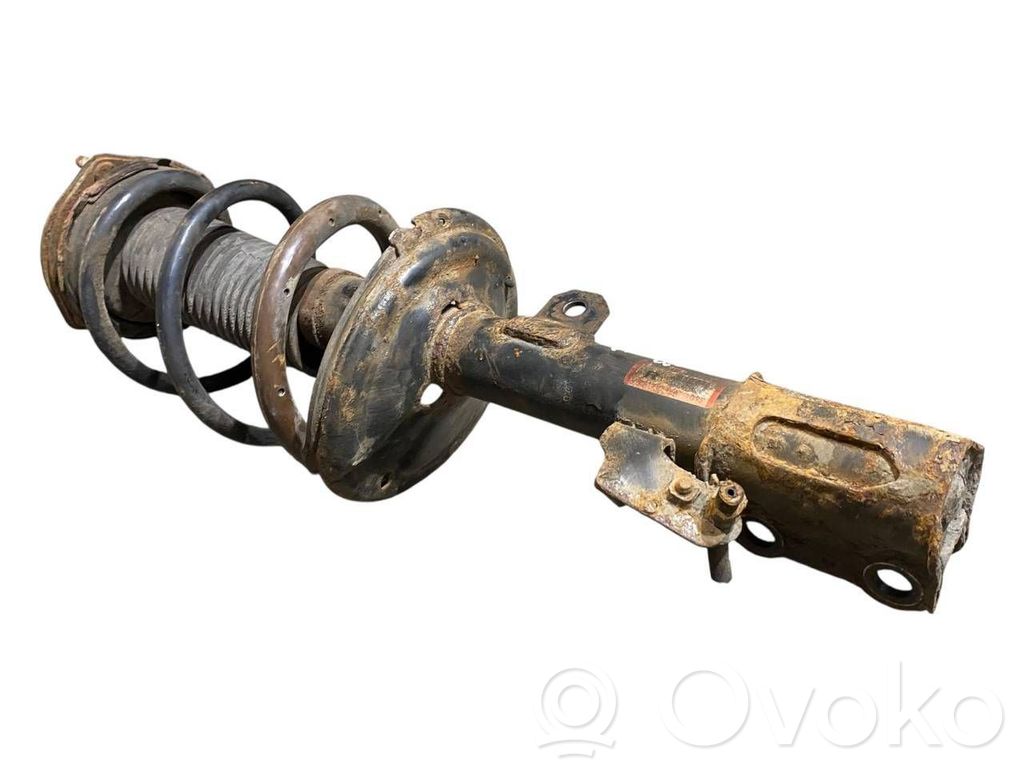 Priekšpusē amortizators ar atsperi