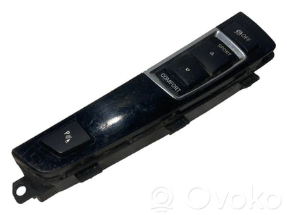 Šasijas aukstuma / stingruma regulēšanas slēdzis