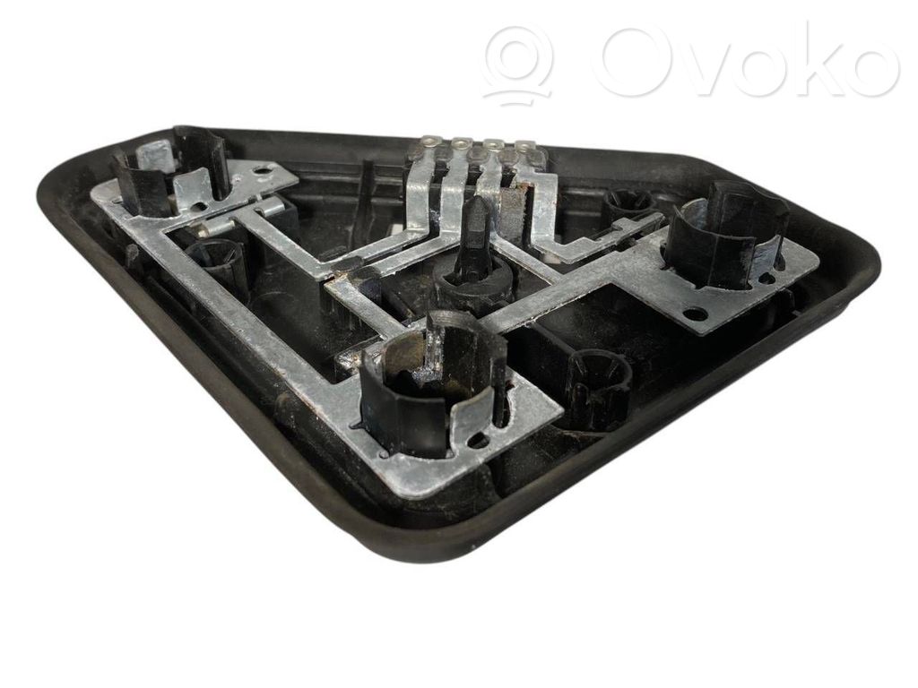 Aizmugures spuldzes vāka turētājs