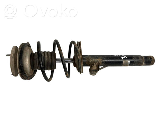 Priekšpusē amortizators ar atsperi