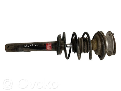 Priekšpusē amortizators ar atsperi