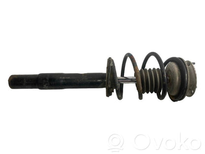 Priekšpusē amortizators ar atsperi