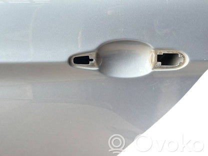 Aizmugurējās durvis