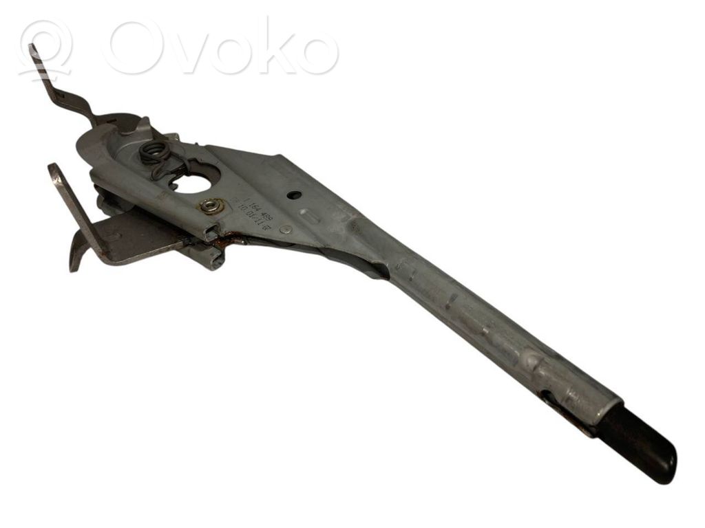 Rokas bremzes mehānisms (salonā)