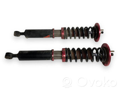 Rear shock absorber with spring