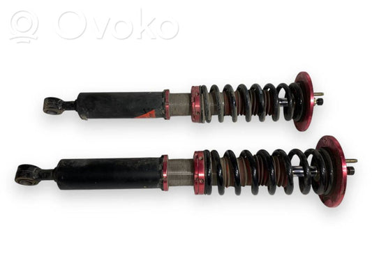 Rear shock absorber with spring