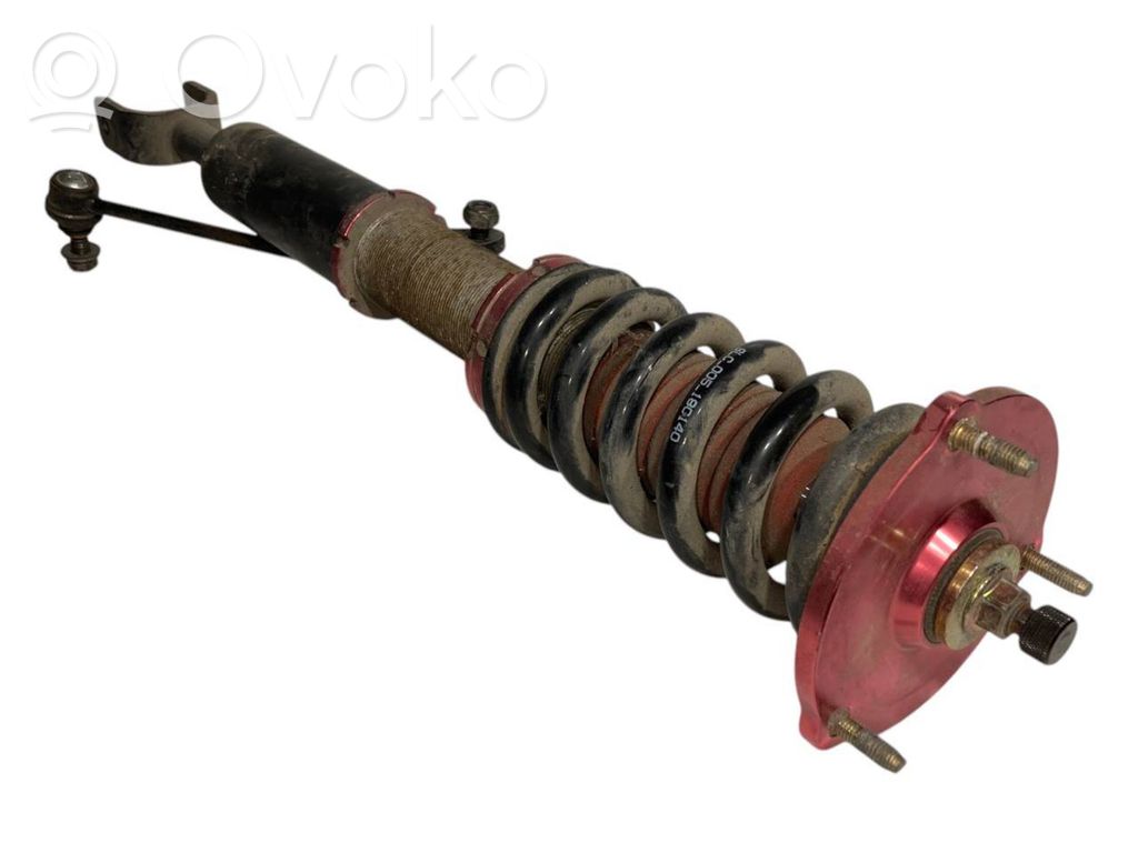 Передний амортизатор с пружиной