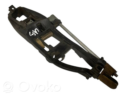 Holder/bracket for external opening handle at the back