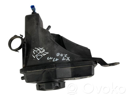 Dzesēšanas šķidruma izplešanās tvertne