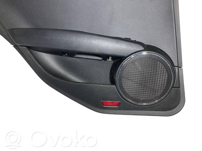 Apšuvums aizmugurējām durvīm