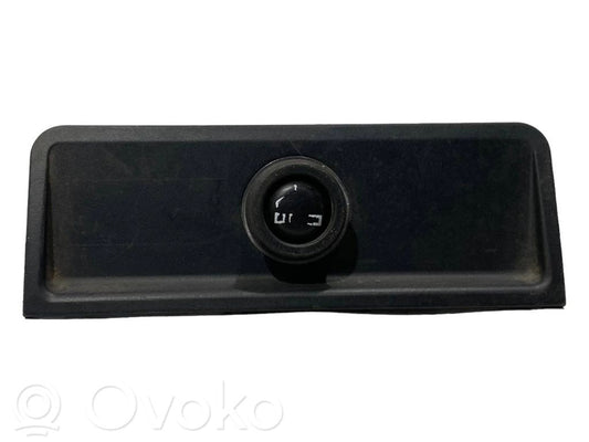 Cigarešu aizdedzināmais aizmugurē