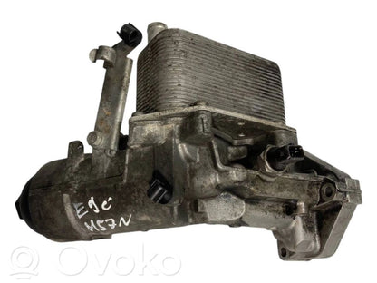 Oil filter holder/cooler