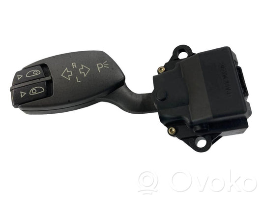 Turn signal/headlight lever