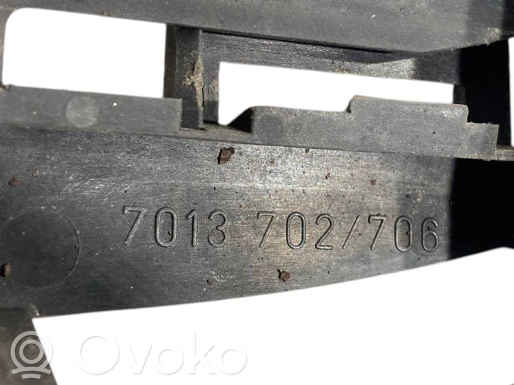 Holder/bracket for external opening handle at the front