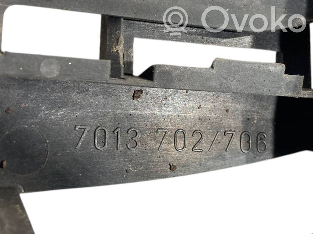 Holder/bracket for external opening handle at the front