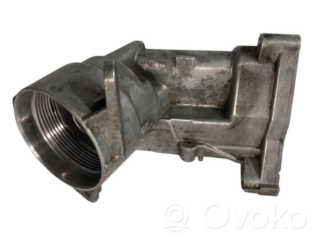 Oil filter holder/cooler