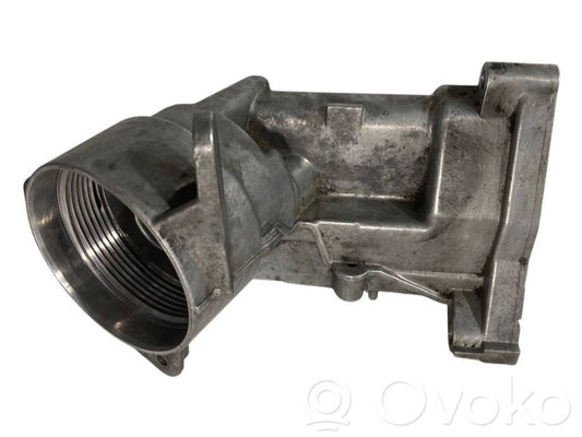 Oil filter holder/cooler