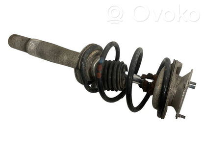 Priekšpusē amortizators ar atsperi