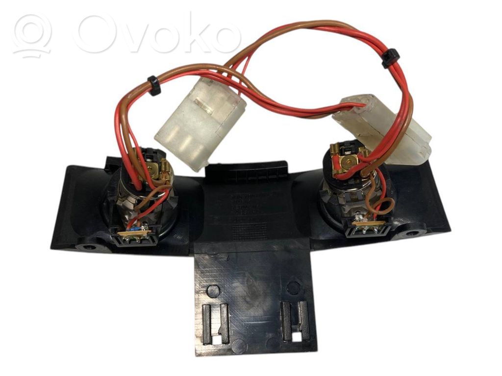 Cigarette lighter in the rear