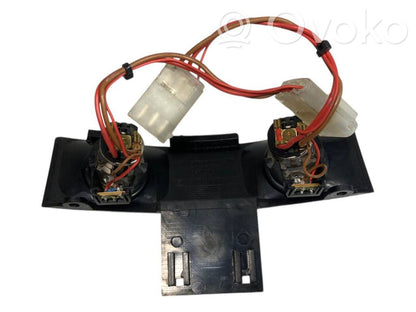 Cigarešu aizdedzināmais aizmugurē