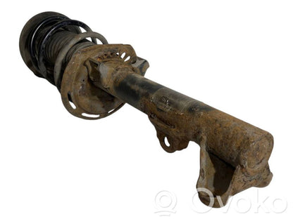 Priekšpusē amortizators ar atsperi