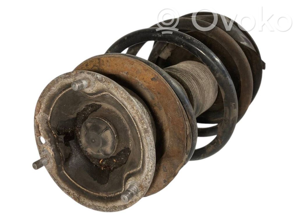 Front shock absorber with spring