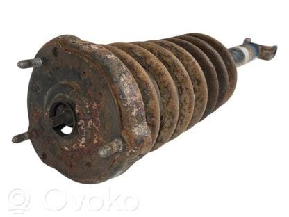 Priekšpusē amortizators ar atsperi